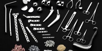 THE SURFACE TREATMENT oF MEDICAL COMPONENTS WITH MASS FINISHING &Amp; SHOT BLASTING